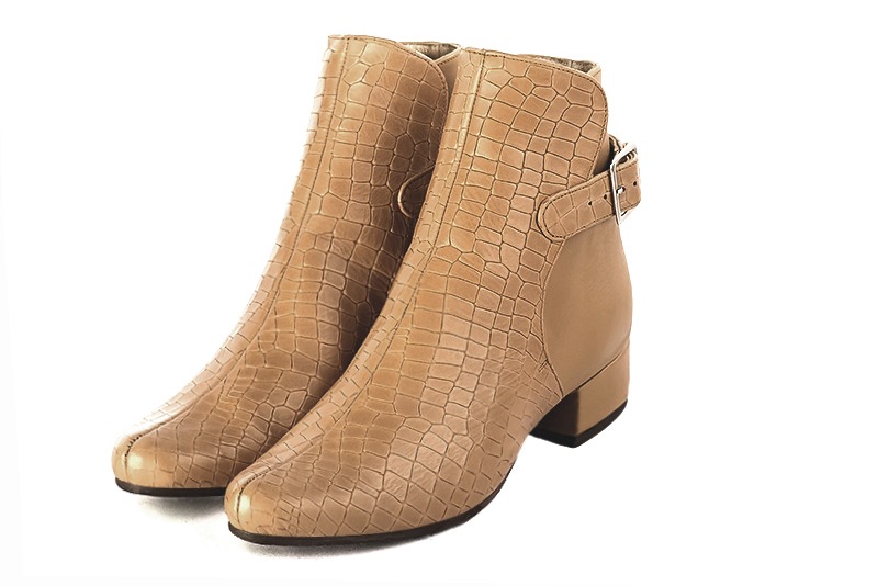 French elegance and refinement for these camel beige dress booties, with buckles at the back, 
                available in many subtle leather and colour combinations. Customise or not, with your materials and colours.
This charming ankle boot fits snugly around the ankle.
It closes on the outside with a buckle.  
                Matching clutches for parties, ceremonies and weddings.   
                You can customize these buckle ankle boots to perfectly match your tastes or needs, and have a unique model.  
                Choice of leathers, colours, knots and heels. 
                Wide range of materials and shades carefully chosen.  
                Rich collection of flat, low, mid and high heels.  
                Small and large shoe sizes - Florence KOOIJMAN